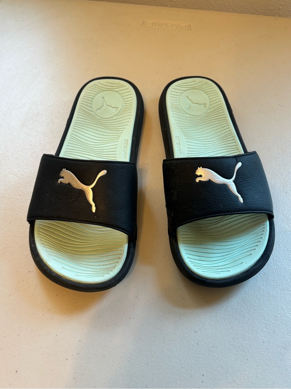 Puma Black Slides with Mint Green Footbed and Silver Logo